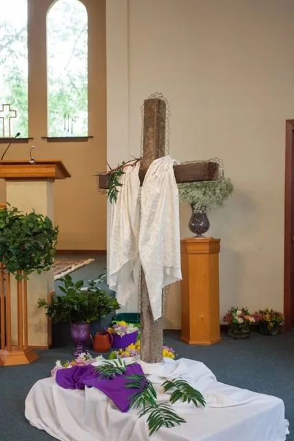 A wooden Easter cross draped in white cloth inside Sonoma Valley Community Church